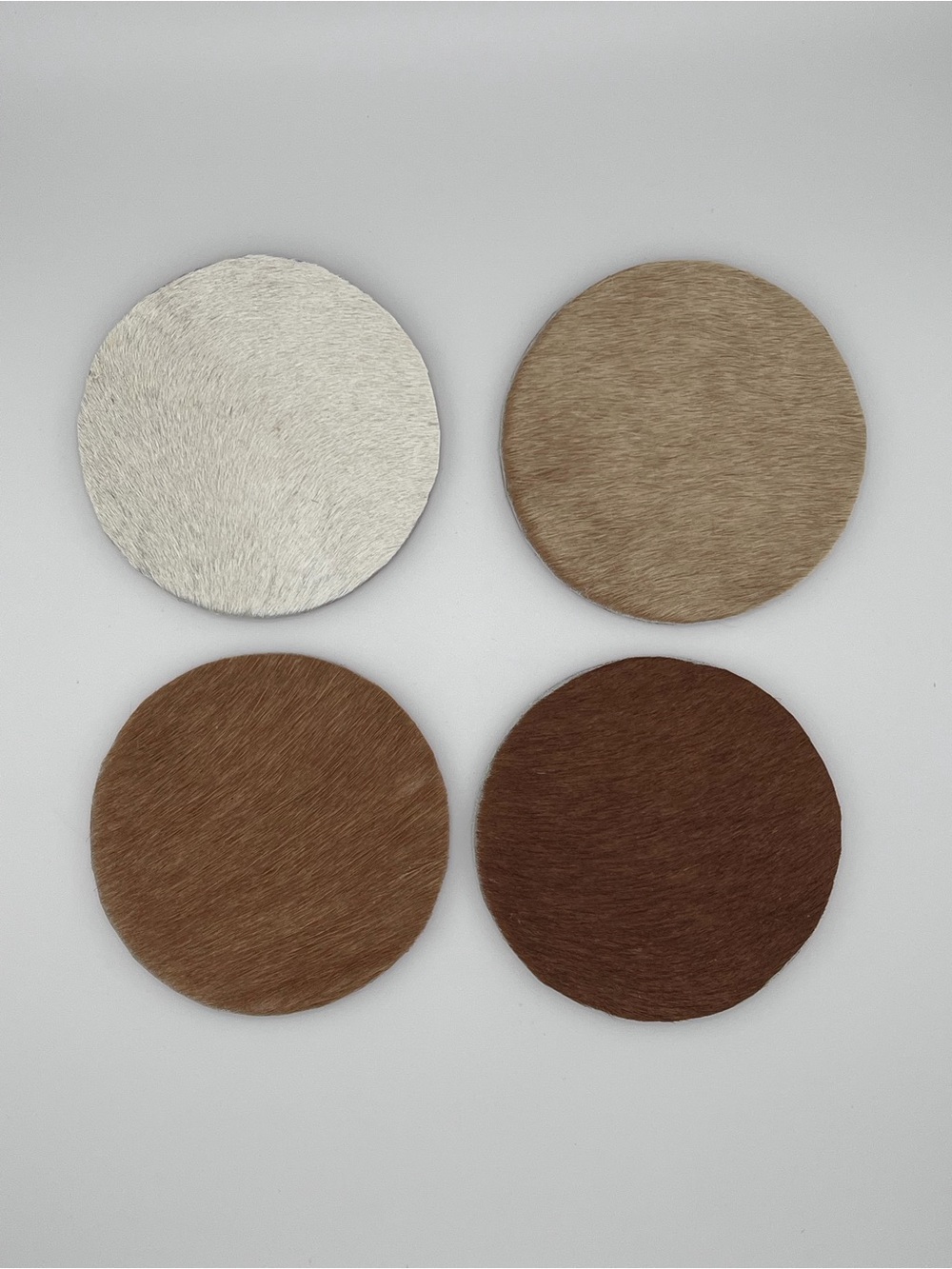 Set of 4 Round Hair-on Leather Coasters in Neutral Tones